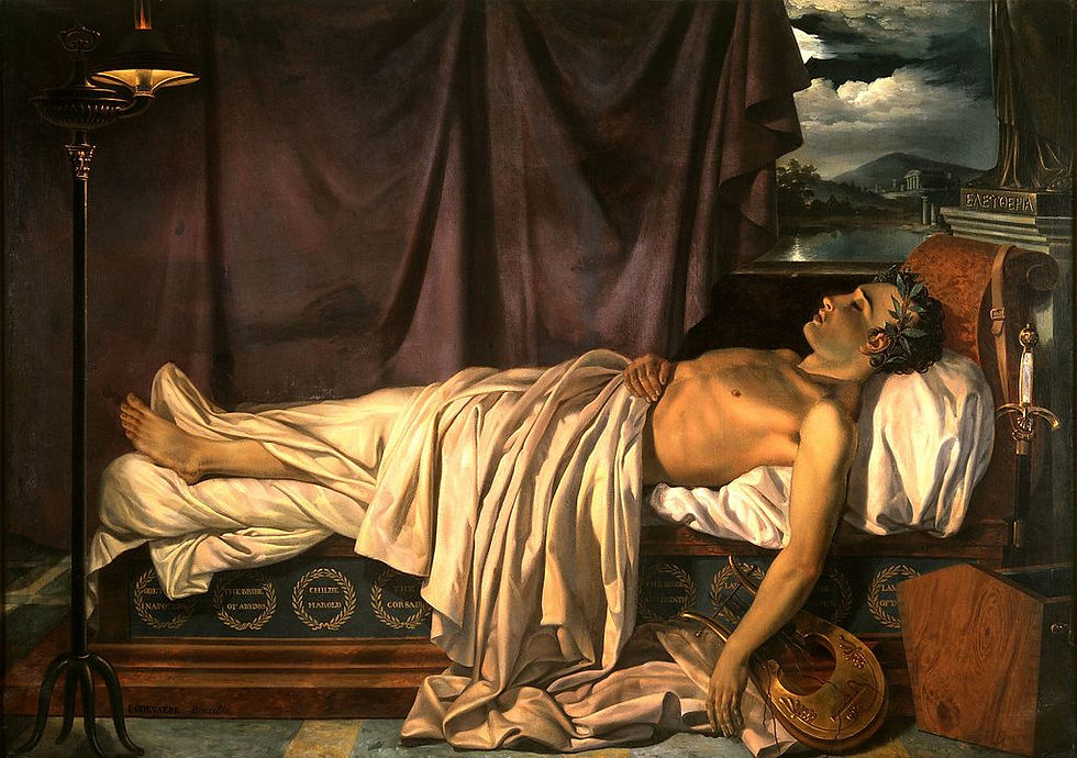 A shirtless Lord Bryon with a laurel wreath on his head lies on a bed partially covered by a sheet. His right foot is entirely covered by the sheet. His eyes are closed and his arm is hanging off the bed.