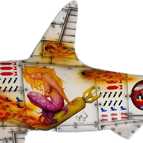 Mermaid nose art on shark mount accompanied by dorsal and pelvic fins featuring bullet holes and flame effects.