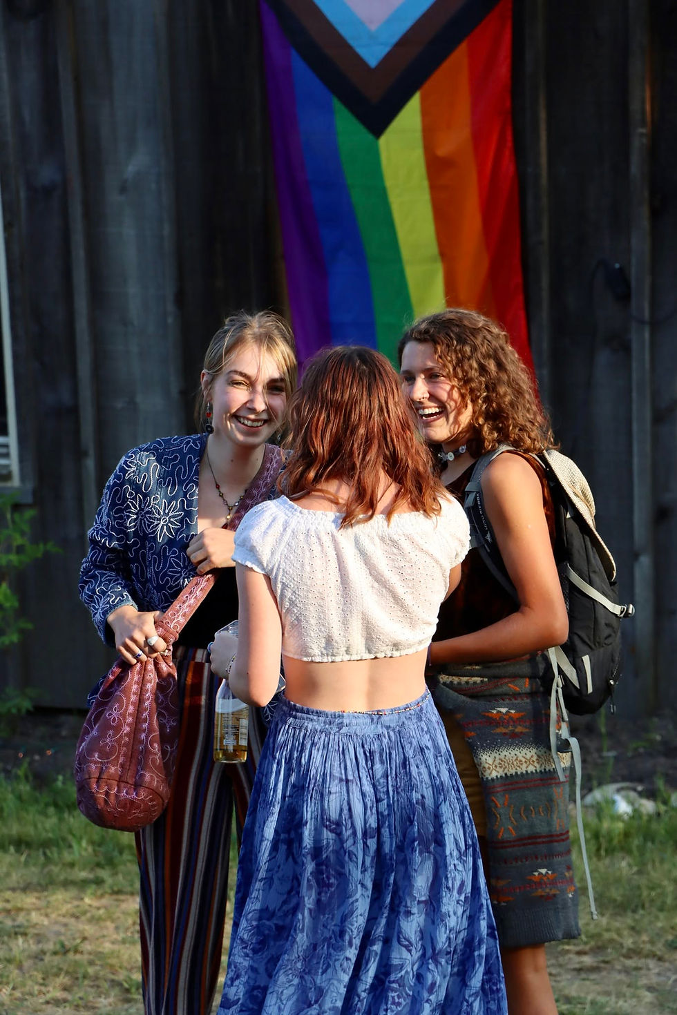 basia sadye with LGBTQ flag.jpg