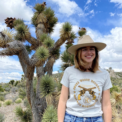 Ladies Gold and Black Smoke Wagon Logo Tee Nevada Distilling