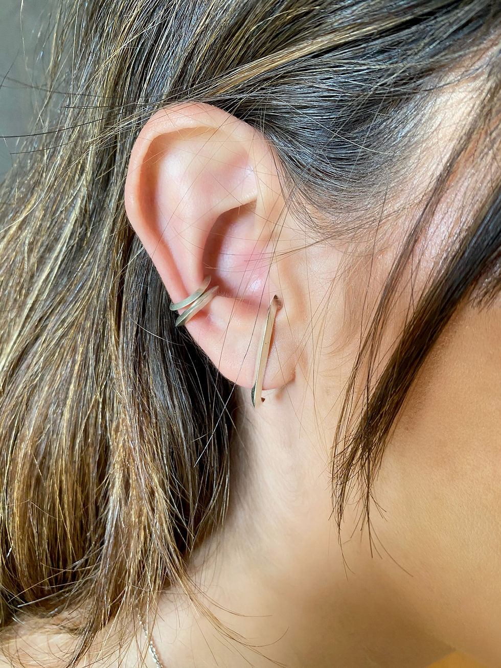 Miniatura: EarHook Triangular