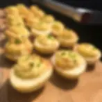 Use your pellet grill to take the classic devilled egg recipe from good to great.