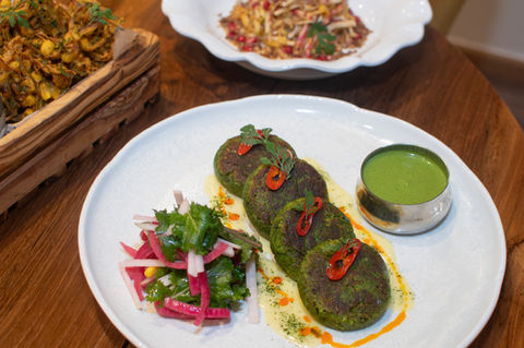 Green vegetable patties with a side salad and green chutney