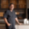 Sleek cabinetry and minimalist style showcased in a European Kitchen Showroom.