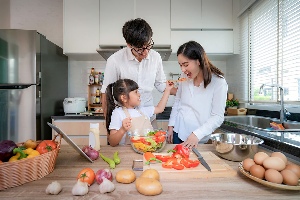 asian-daughters-feeding-salad-her-mother-her-father-stand-by-when-family-cooking-kitchen-h