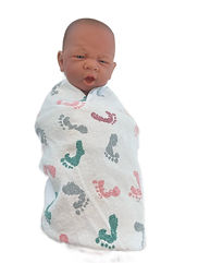 Swaddled baby doll in hospital swaddle