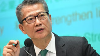 Hong Kong Growth Outlook Strengthens as Chan Lifts 2025 Forecast to 3.2%