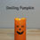 Thumbnail: Decorative fall and Halloween tea light candle holder, 1.75"x3.1", cheerful seasonal designs.