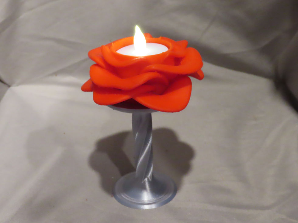 Decorative flower tea light candle holder, 1.75" diameter, 3.1" tall, fits standard tea light candles.