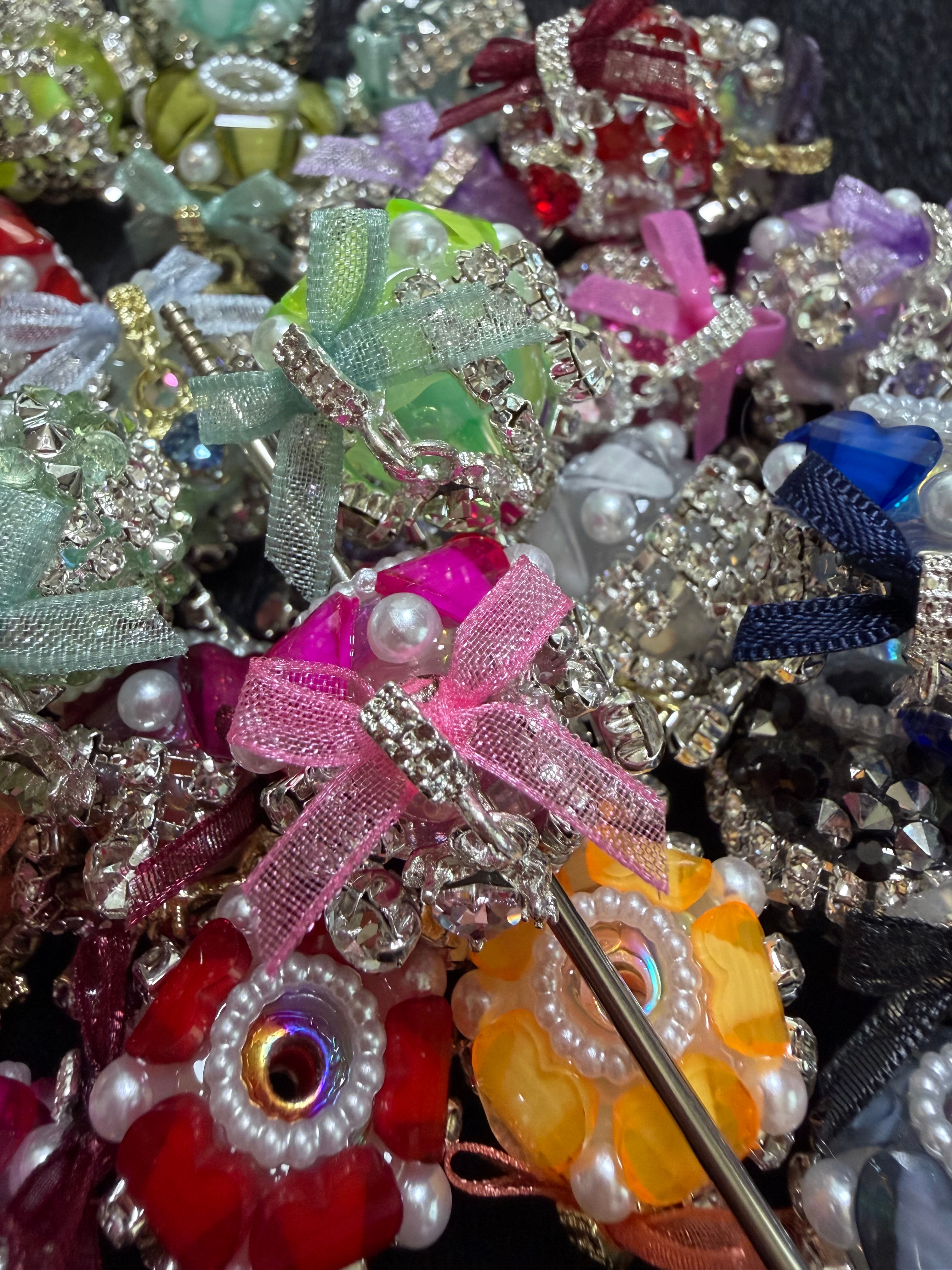 Fancy beads with bows, and bling dangles