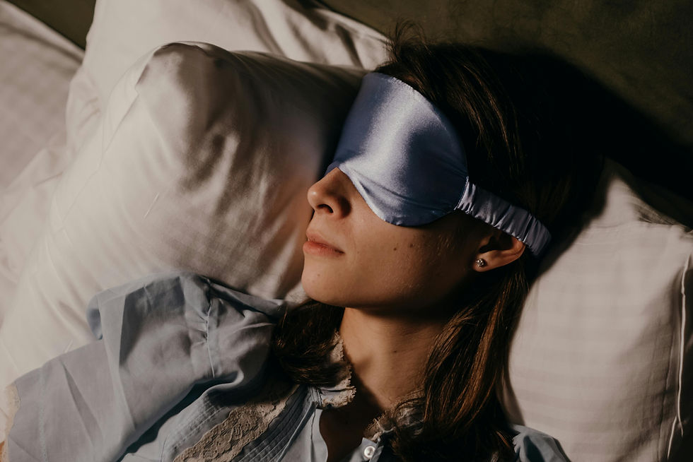 Woman sleeping peacefully with eye mask.