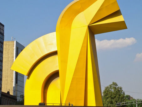 El Caballito yellow geometric sculpture by Sebastián in Mexico City exploring form and mathematics in public art