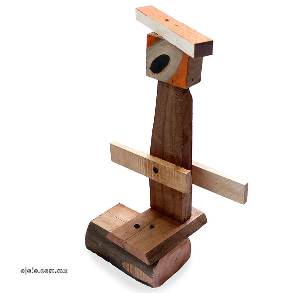 wooden eye 5. Wooden sculptural tower with cubic head containing black circle, extended arms and solid base