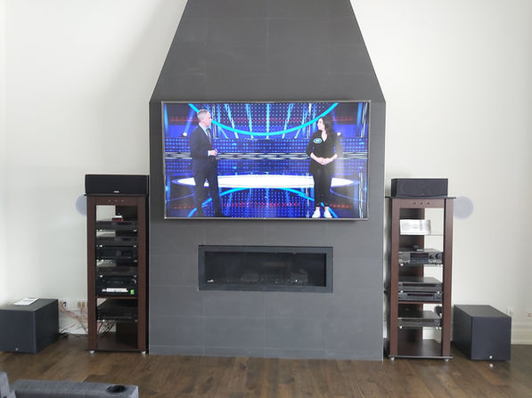 Custom home theater installation with projector and surround sound in Newmarket