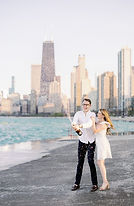 couple popping champagne captured by a Chicagoland wedding photographer