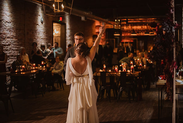 bride and groom's first dance at an industrial wedding venue in minnesota