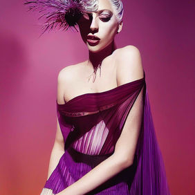 NhungMek_Gaga_opted_for_a_sheer_purple_pleated_gown_with_an_imp_a6f62bbe-d0ec-439a-9d26-35
