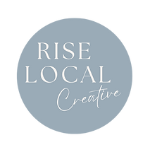 Round RiseLocal Creative logo with soft blue background and white script