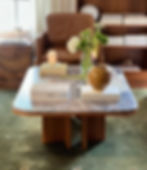 mixing styles leather chair and marble coffee table