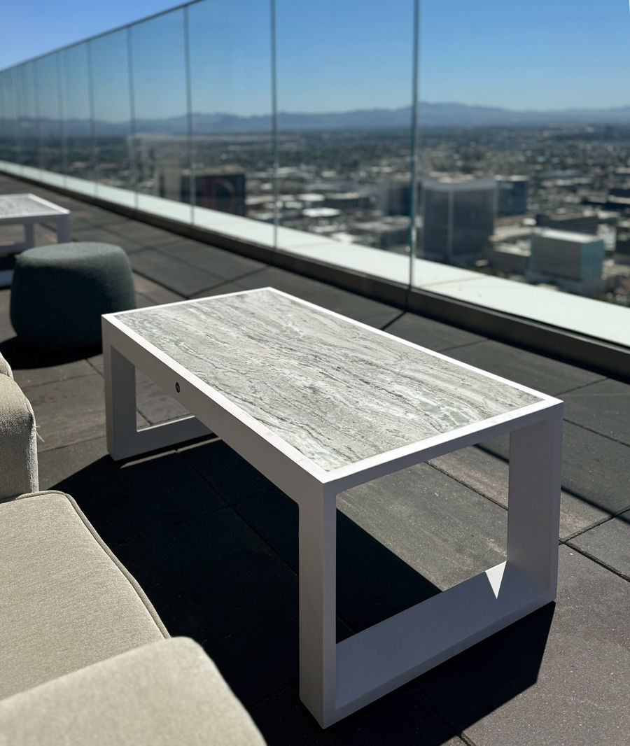 Modern outdoor table on a commercial rooftop patio