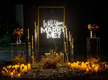 Proposal Set in Sarasota with Soft candlelight and delicate florals create a luminous, romantic setting designed for a truly 