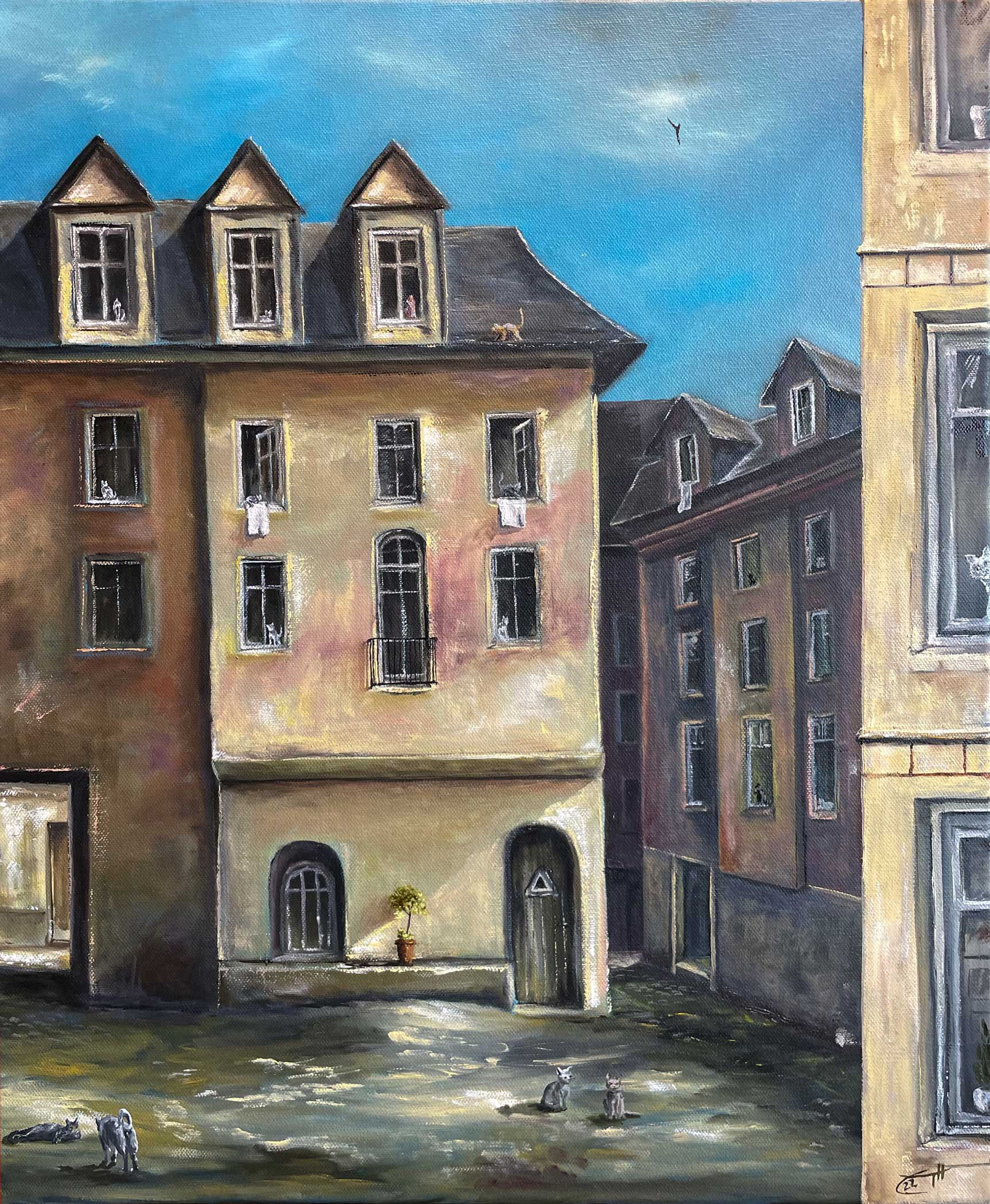 Gemaltes Stadtbild mit Wäsche an den Fenstern