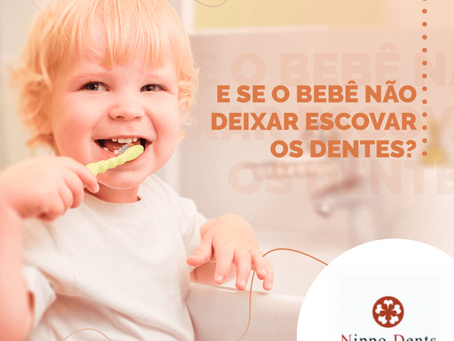 E se o bebê não deixar escovar os dentes?
