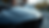 Close-up view of a shiny car hood with ceramic coating