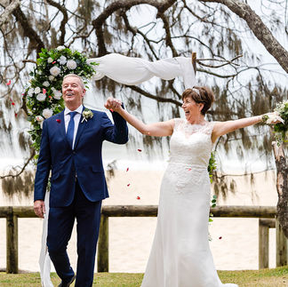 Wedding coupled excited at their Noosa Wedding ceremony on the beach