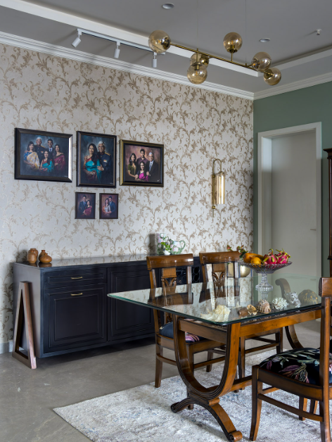 The dining space with the Kashmiri walnut furniture becomes the centre of conversations. A golden memory wall showcases photographs of the family.