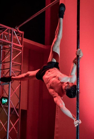 Devin performing pole