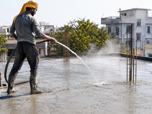 Curing Concrete — Why Watering Your Slab for 28 Days Actually Matters