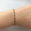 Thumbnail: Black gold dot bracelet
