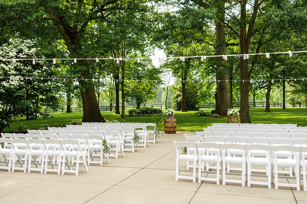 The outdoor ceremony area of The Polo Barn at Saxony Farm, decorated for a wedding.