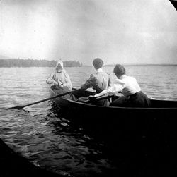 38a, 3 women in boat