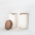 ceramic jars by Yahalomis, with cork lids