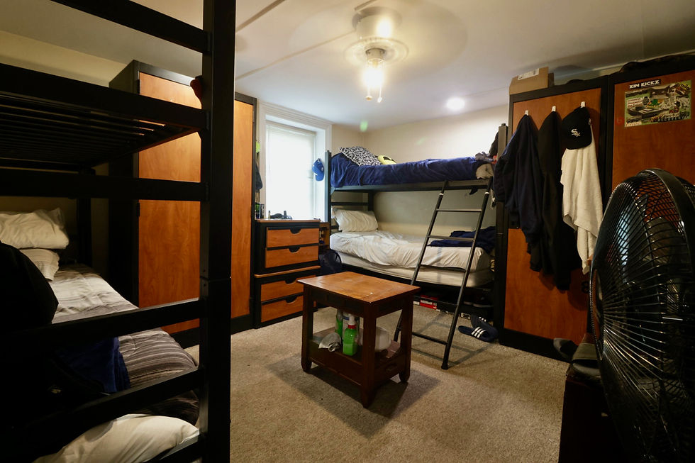 interior bedroom of the house with 4 bunks