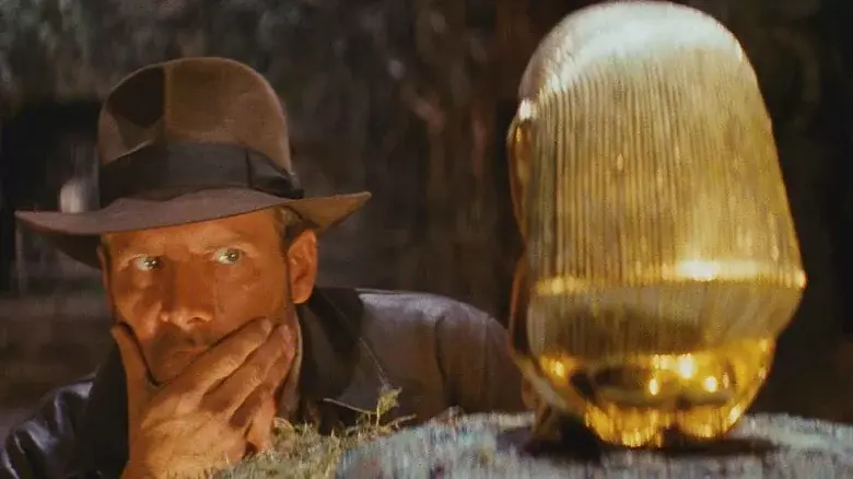 Indiana Jones: Raiders of the Lost Ark. Indiana is contemplating how to retrieve the idol.
