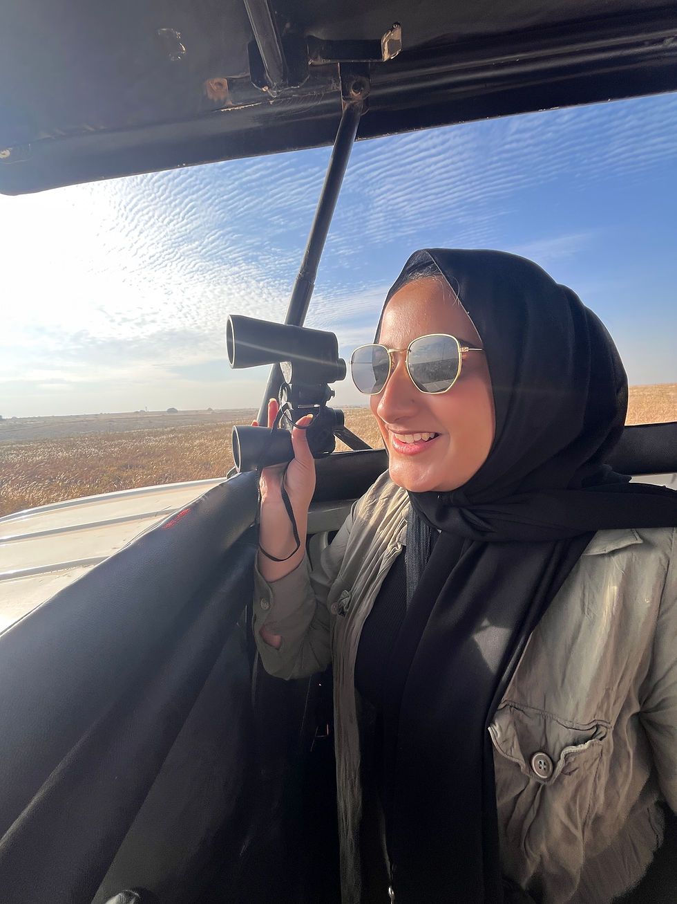 Saleha looking out at the beautiful animals in our visit to Kenya