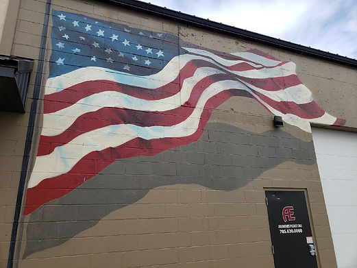 Since the struggle of the Revolutionary War, the flag of the United States has served as a symbol of unity, the perfect representation of our town's ever faithful patriotism.