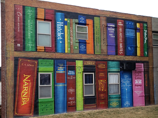 Located adjacent to the historic Clay Center Carnegie Library, this mural is a bookworm's delight! Featuring an array of timeless novels, there is something for every reader to enjoy.