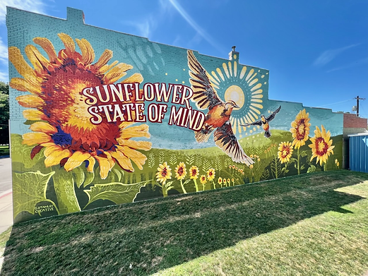 When you can't find the sunshine, be the sunshine. It's safe to say this mural gives all Kansans "the feels" with this sweet reminder to find the beauty in every day.