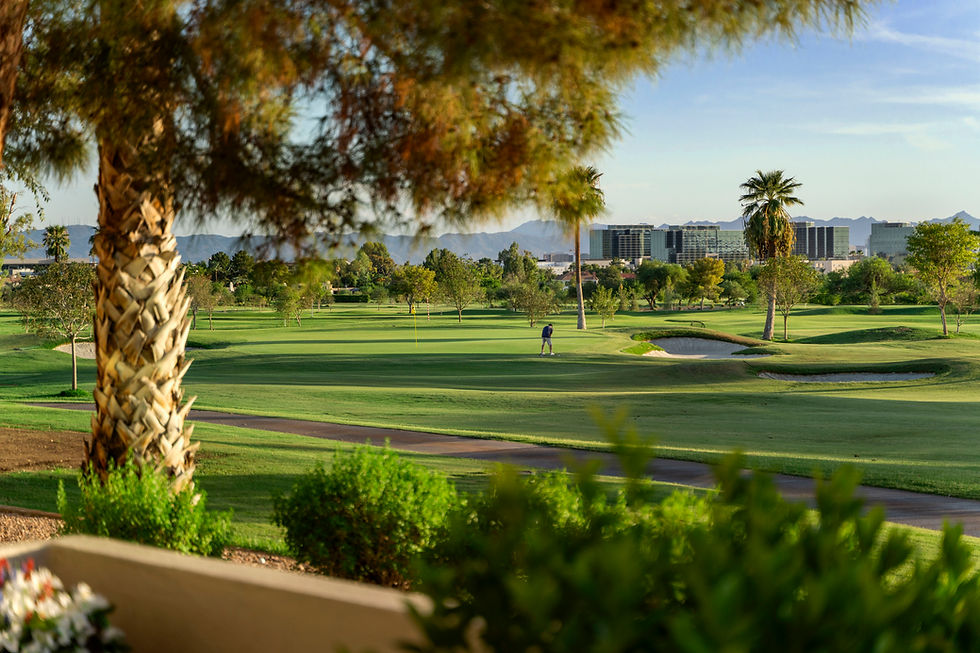 Extended patio at 8 Biltmore Estates Unit 124 opening directly onto the 10th hole of the Estates golf course in Phoenix