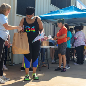 Youth World (July 24, 2021B). Darla helping us handout produce bags.