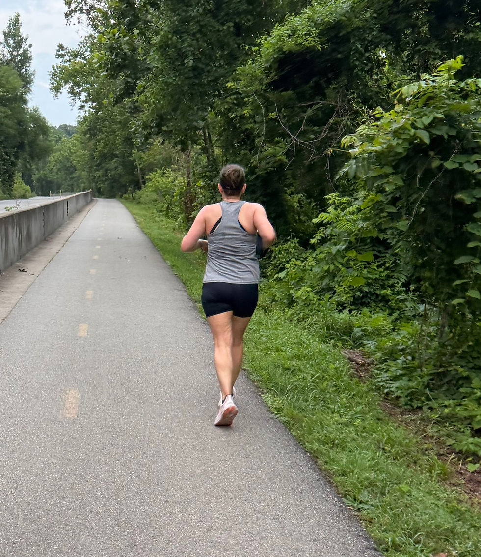 Melissa running down a path