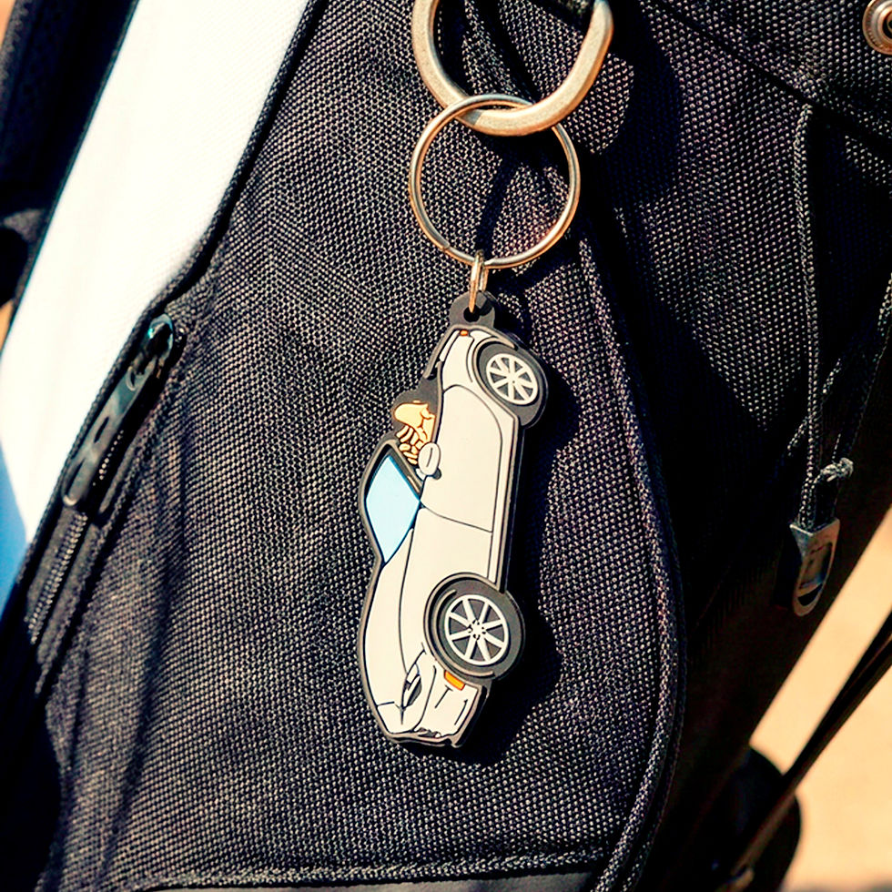 Thumbnail: Custom Mazda Miata PVC keychain featuring a detailed front-view sports car design in durable soft rubber PVC with a silver ke