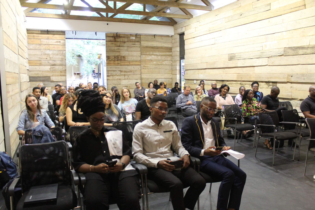 Attendees of a meeting in The Village Opera House.
