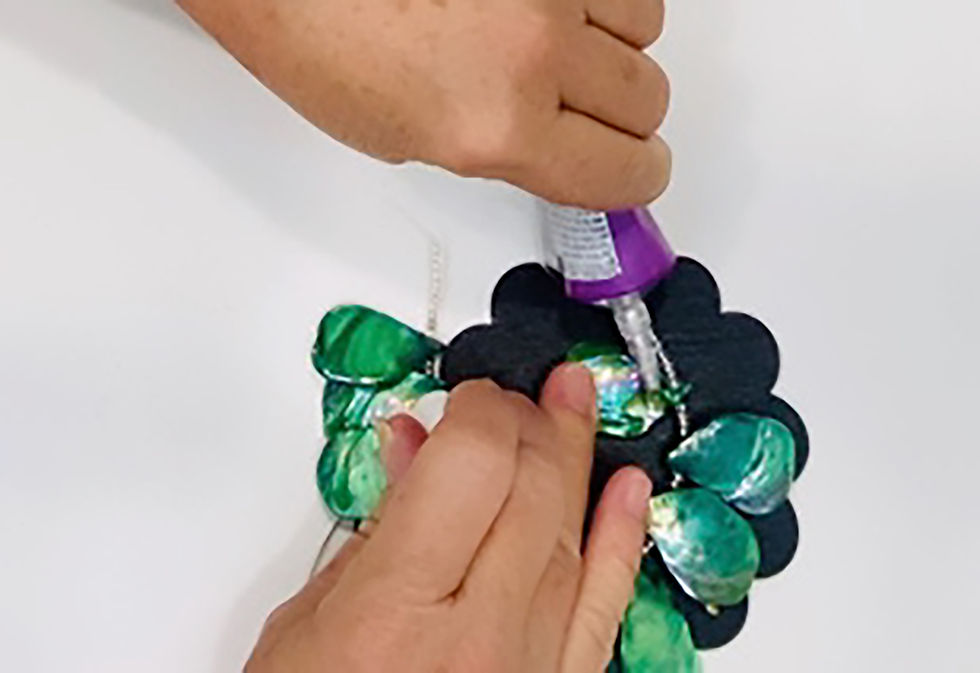Gluing down the ornament components