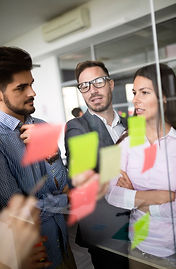 office team with sticky notes