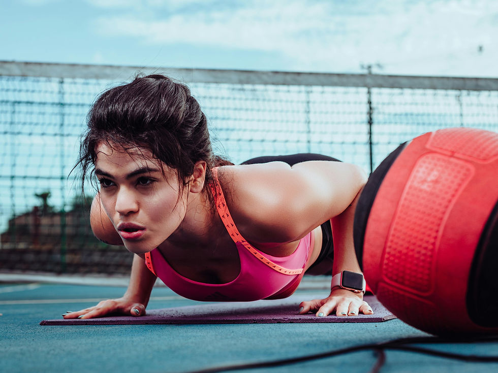 Woman in athletic gear doing functional training.